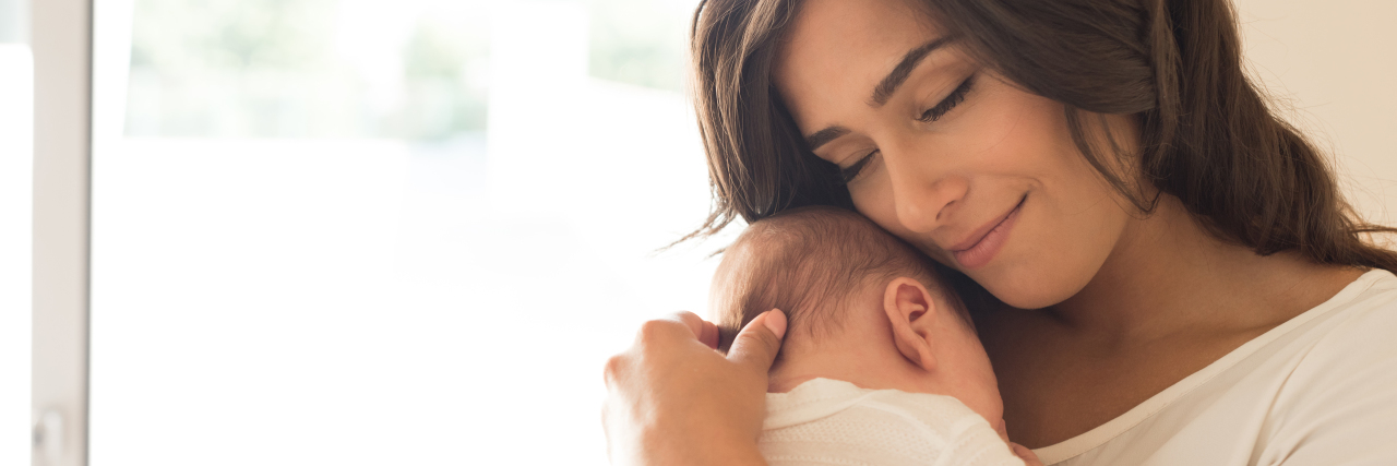 To Parents Whose Child Was Just Diagnosed With Hurler Syndrome Woman with newborn baby