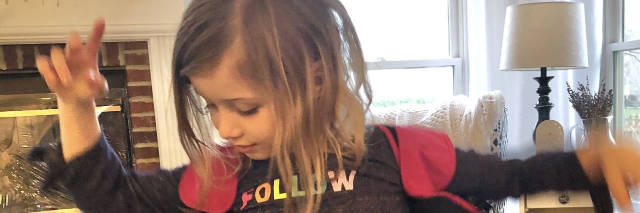 Embracing an Unexpected Life Parenting a Child With Cystic Fibrosis Laura's daughter dancing.