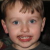 Kathy's son Ryan as a small child with chocolate on his face.