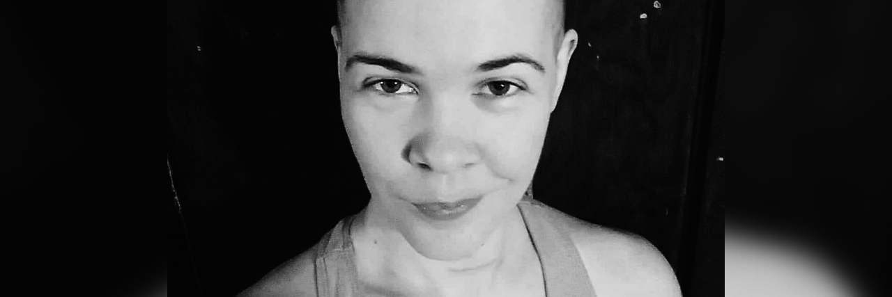 How Your Chronic Illness Impacts Friends and Family the author with short hair wearing a crown