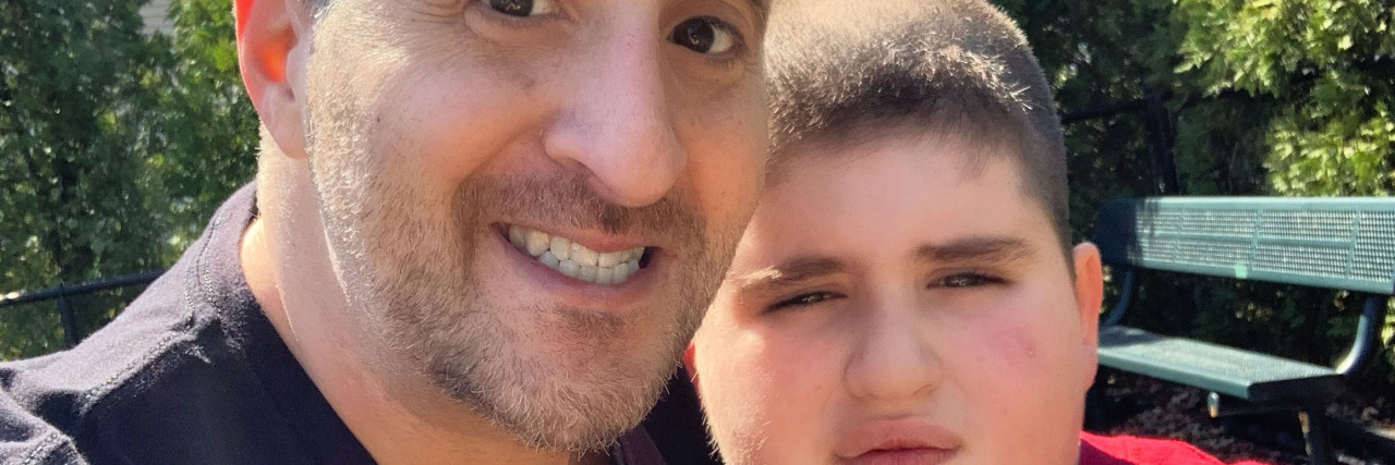 Why I Believe Autism Awareness Is Still Needed James and his son Lucas outside.