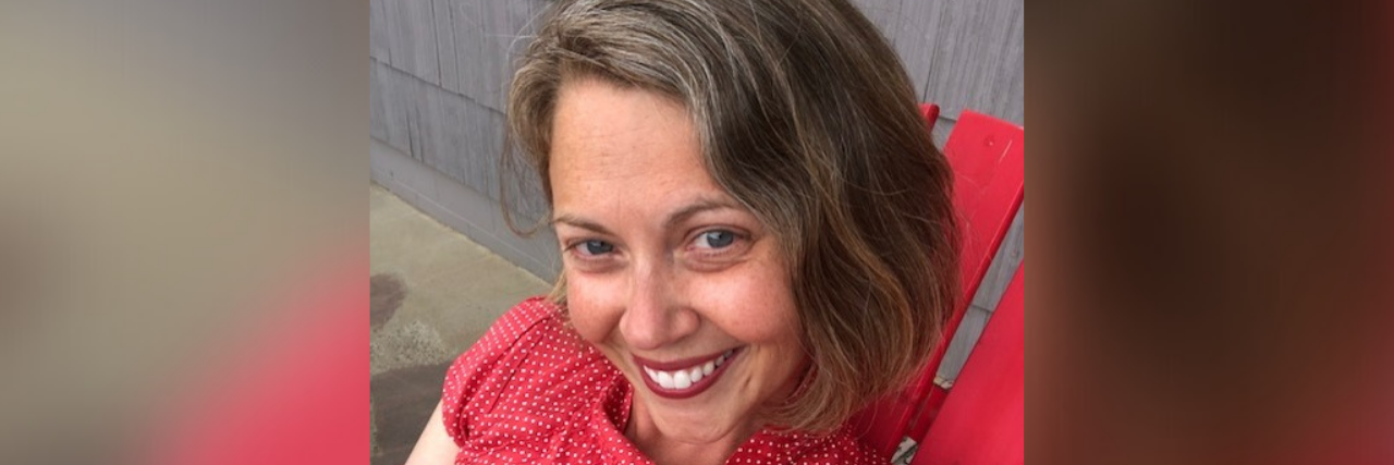 A Reading List of Memoirs on Mothers Impacted by Mental Illness  Photo of contributor wearing a red shirt and smiling