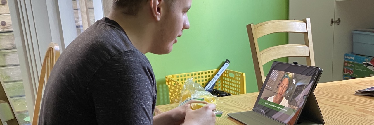 Why Online Church Services Should Continue Beyond the Pandemic Stephen's son Logan watching church on his tablet.