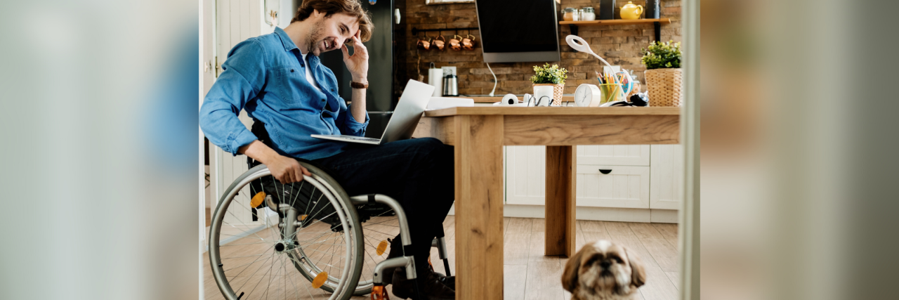 Experiencing Employment Discrimination Because of My Disability Man in wheelchair working from home.