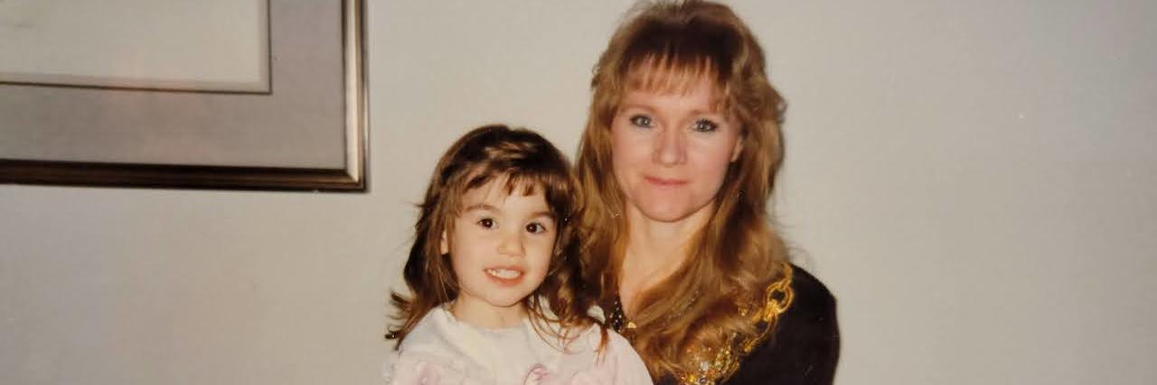 Life Lessons From My Mom That Have Helped With My Chronic Illness Photo of contributor as young child sitting on her mother's lap