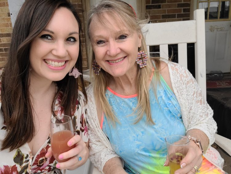 Photo of contributor and her mother with faces together and smiling at the camera