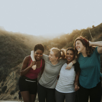 Diverse group of friends hiking through the hills of Los Angeles