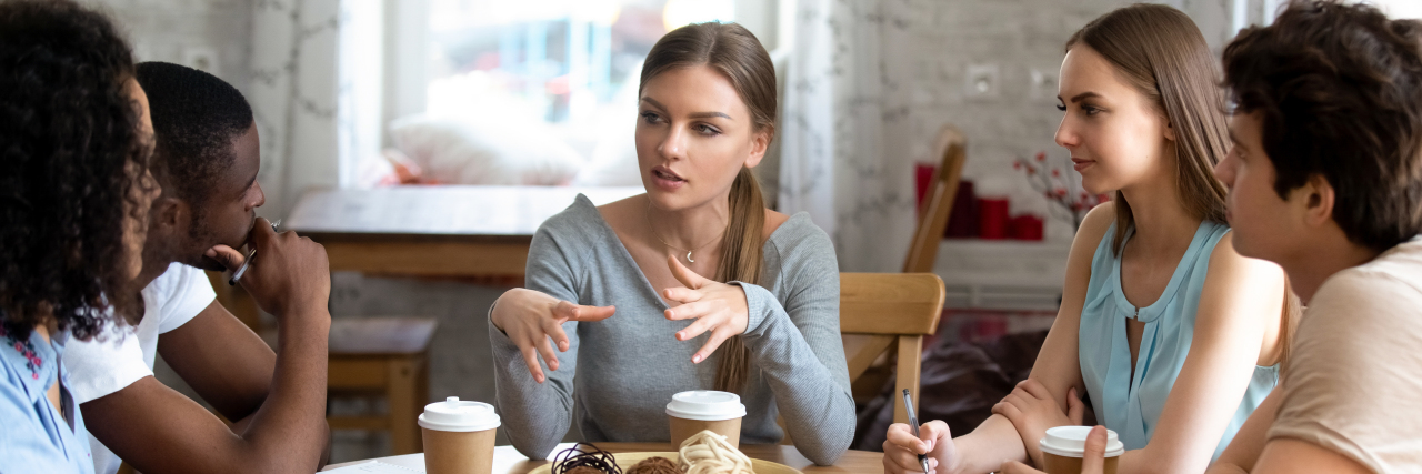 To My Friends and Family Who Don’t Have Fibromyalgia Diverse friends sitting around table drinking coffee.