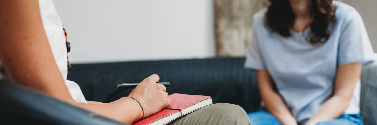 We Need to Talk About Mental Health and Living With Chronic Illness Psychotherapy session, woman talking to therapist.