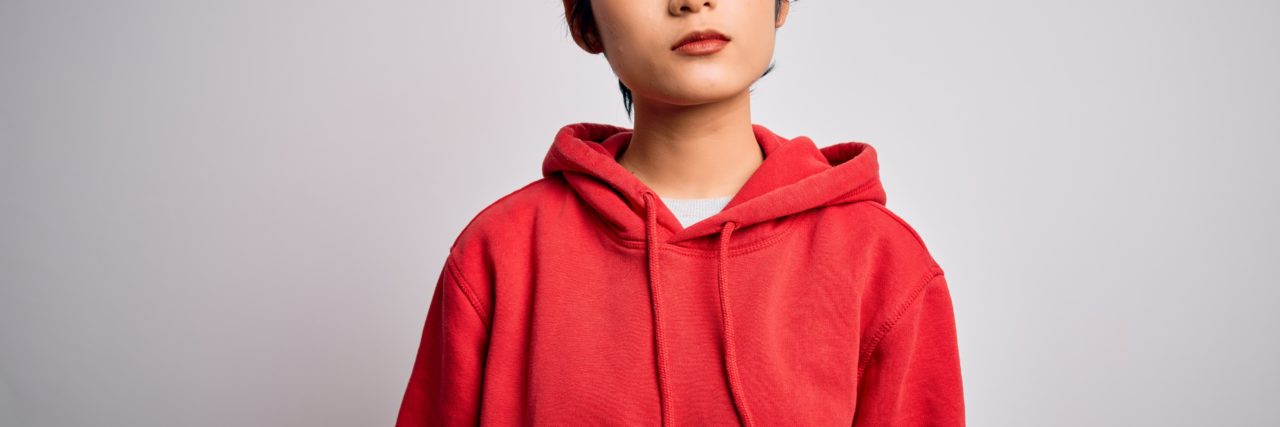 Reclaiming My Asian Heritage from Generational Trauma Chinese girl looking at camera