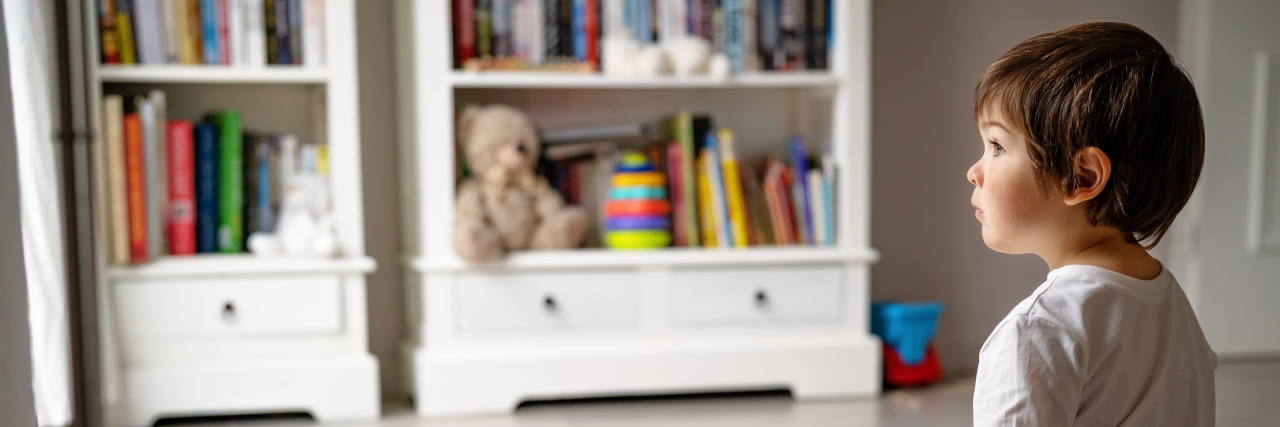 When People Ask How My Son With Hurler Syndrome Is Doing Boy playing with blocks.