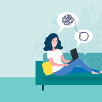 woman staring at computer flustered