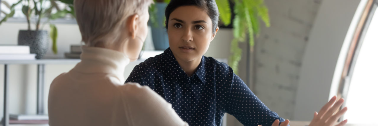 Why Self Diagnosed Individuals Need To Be Covered Under the ADA Woman discussing something with another woman