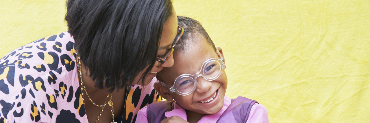 Becoming an Advocate for Your Autistic Child Mother embracing son.