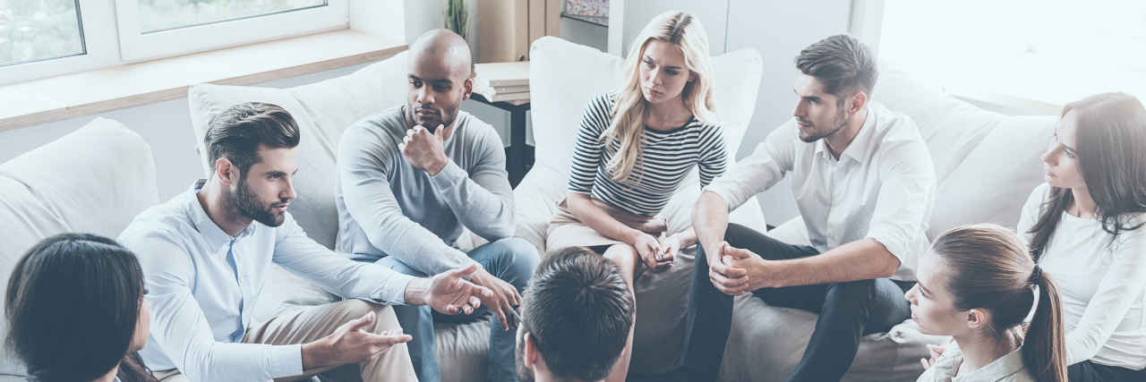 Diverse people at a support group.