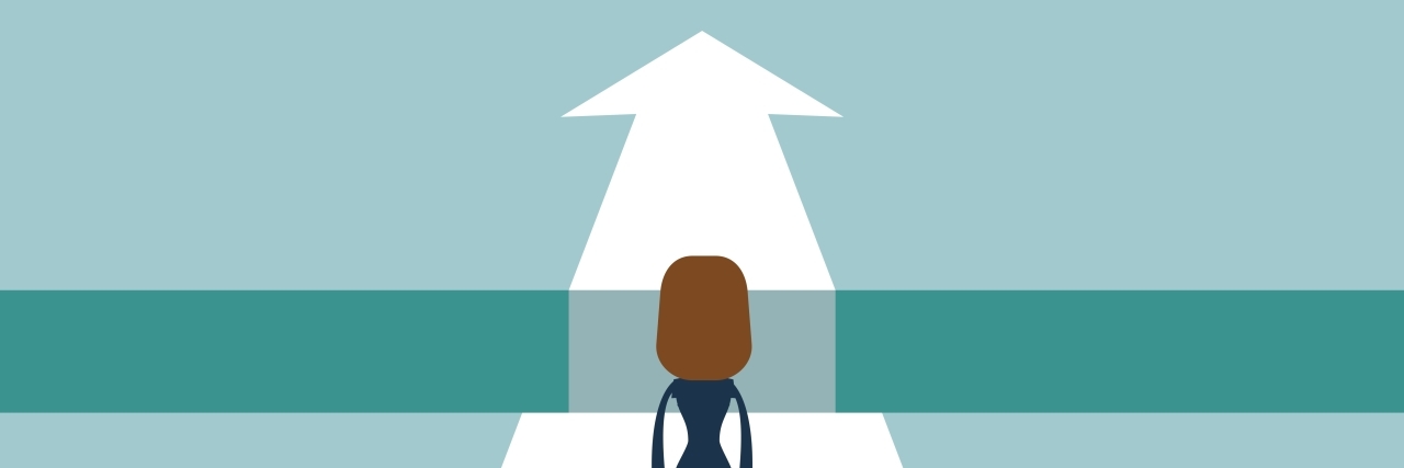 6 Hidden Obstacles People With Rare Diseases Face Woman standing on the edge of gap.