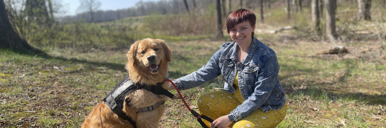 How My New Job on the Other Side of the Criminal Justice System Impacts My Recovery Contributor outside with her dog standing in the grass in front of trees and blue sky
