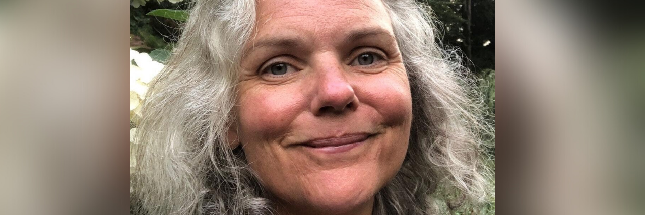 How Boundaries Improved Relationships in My Neurodiverse Family headshot of author; older white woman with curly white hair smiling