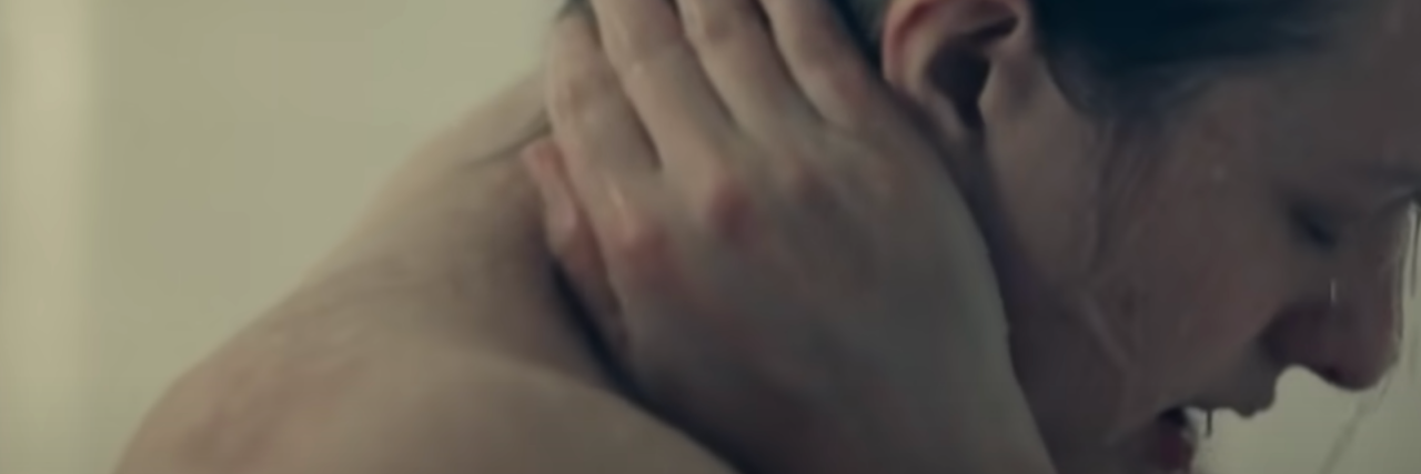 How The Handmaid’s Tale Perfectly Depicts PTSD Someone from the handmaids tale showering