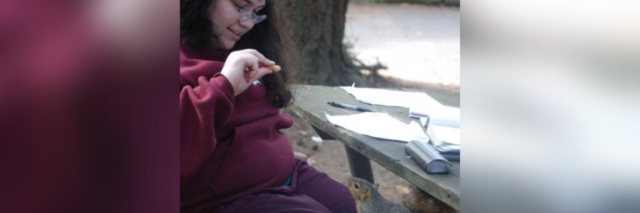 Leslie befriending a squirrel at Reed College in 2008.