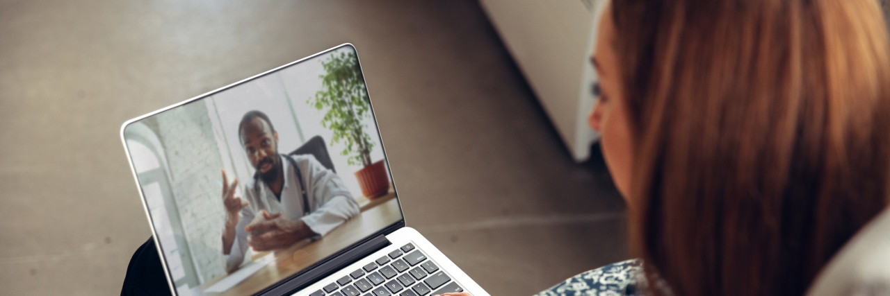 KHN: Doctors Tell How to Make the Most of Your Telehealth Visits Close up of young woman getting medical advice over telehealth