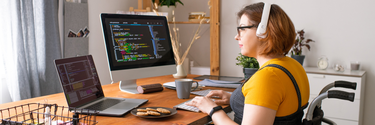 How COVID Made Work Accessible to Me as a Person With Cerebral Palsy Woman in wheelchair working on laptop from home.