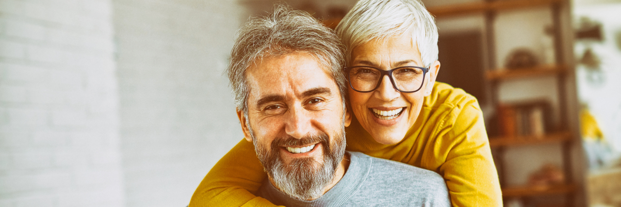 Portrait of happy smiling older couple at home.