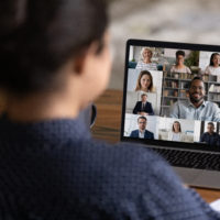 Woman attending a Zoom meeting for work.