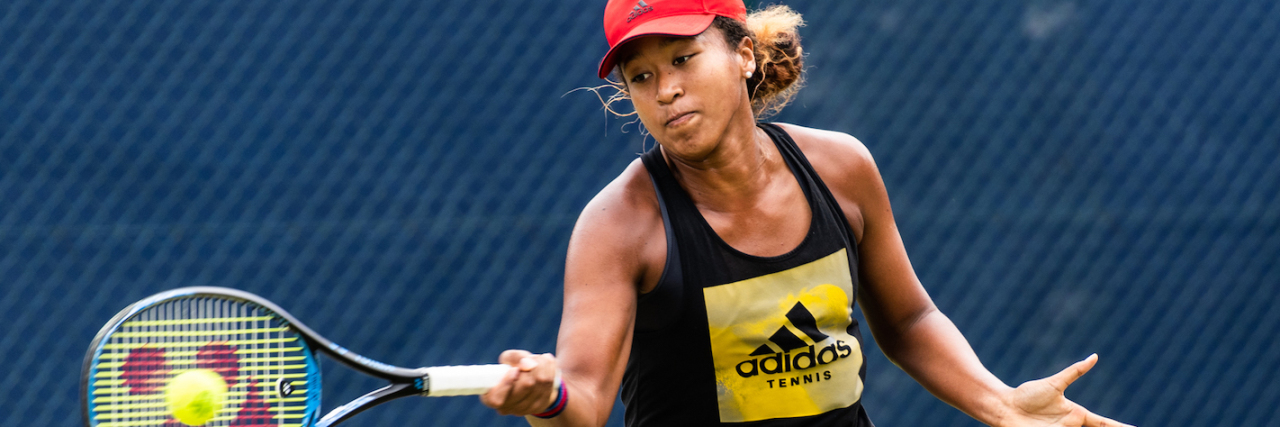 Naomi Osaka: What Happens When Black Women Have Social Anxiety Naomi Osaka playing tennis