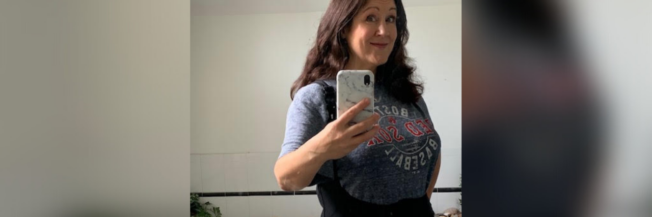 Why I Created the Hot Disability Aid Summer Instagram Challenge Wearing her cooling vest.