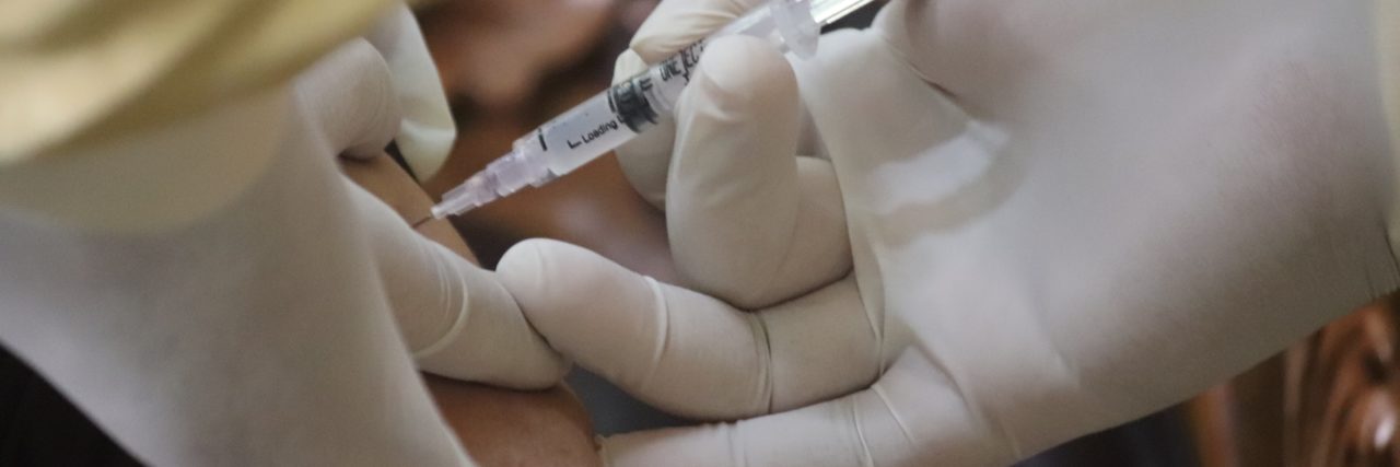 What Happened When A Vaccine Hesitater Got the COVID-19 Vaccine Person receiving COVID-19 vaccine