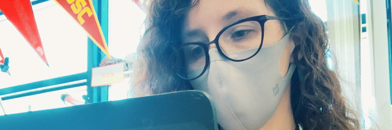 Masking My Autism When Returning to In-Person Work Ammelia wearing a face mask.