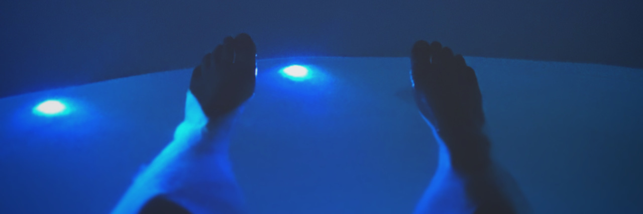 photo of the contributor's floatation tank experience with coloured blue lights