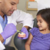Dentist with child patient.