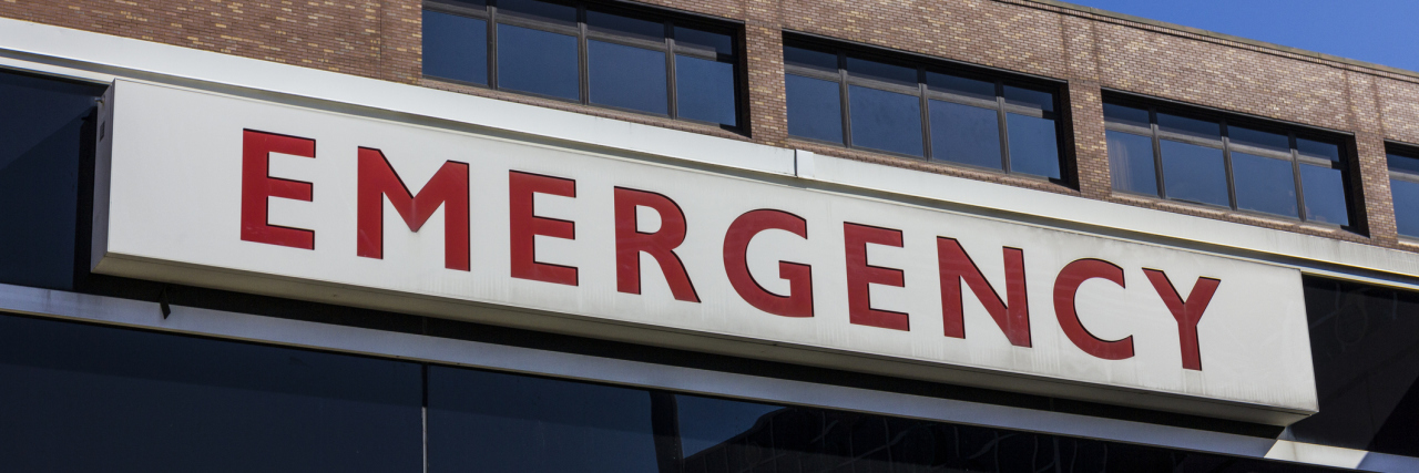 Red and white emergency room entrance sign