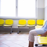 Patient sitting in a waiting room