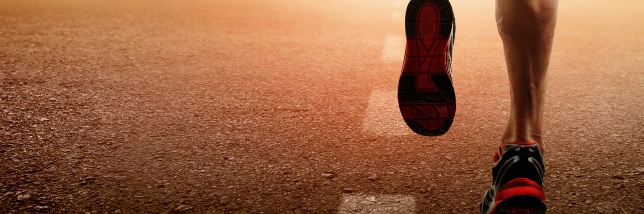 How Getting Going Each Day is Like Running a Marathon a man's legs running