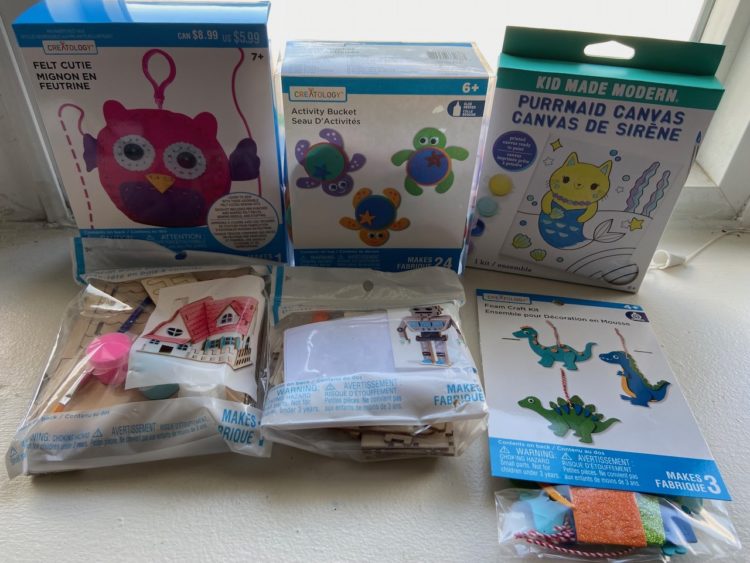 Photo of boxes and bags of crafts 