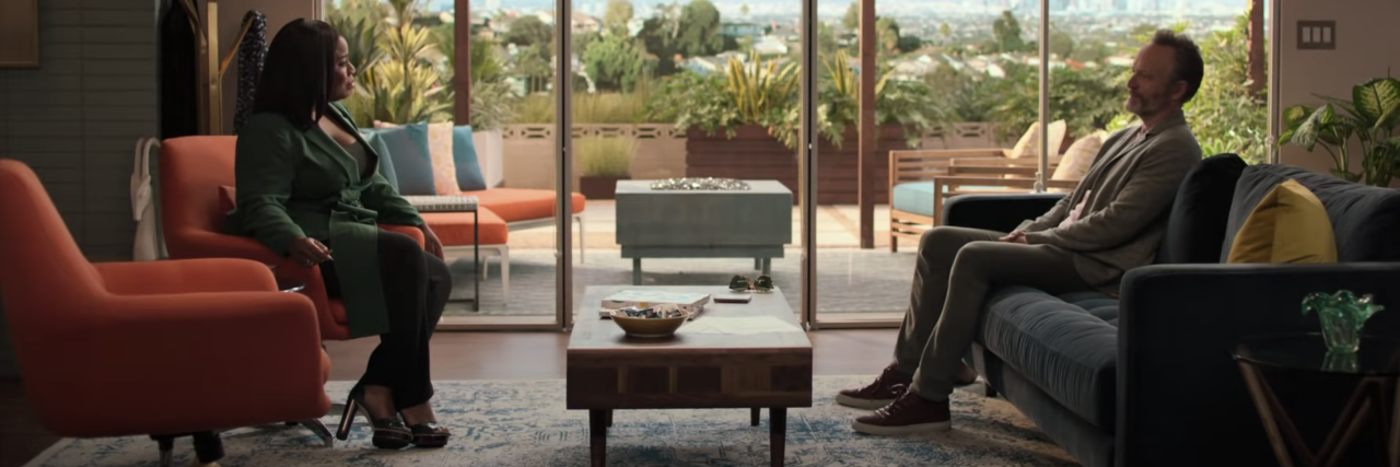 This HBO Show Gives Us an Accurate Glimpse Into The World of Therapy screenshot of HBO's "In Treatment" showing therapist and patient facing each other on chairs with huge windows behind them