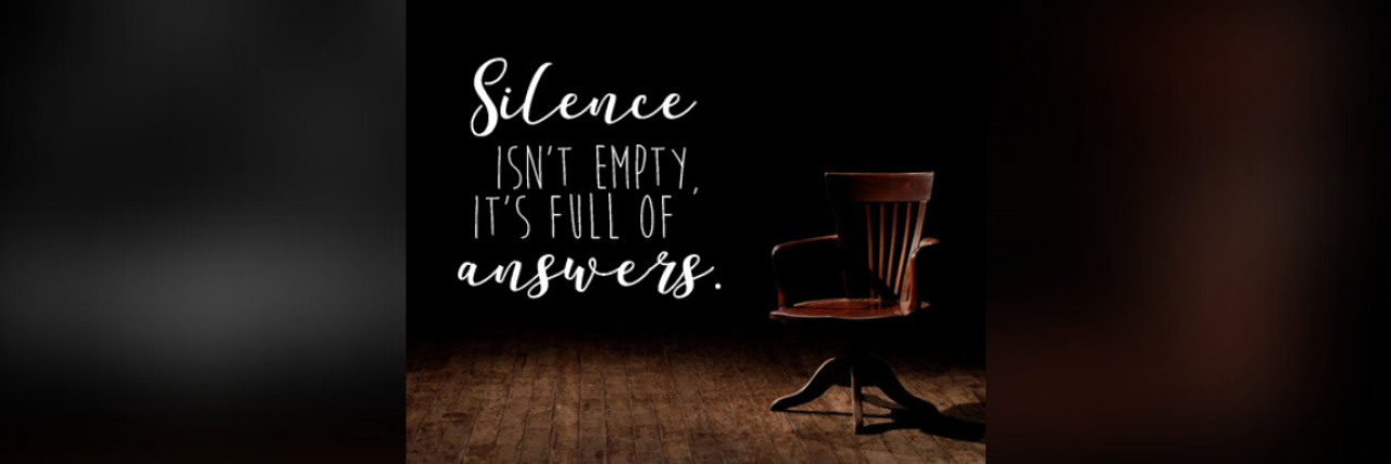 Photo of an empty chair with the words "Silence