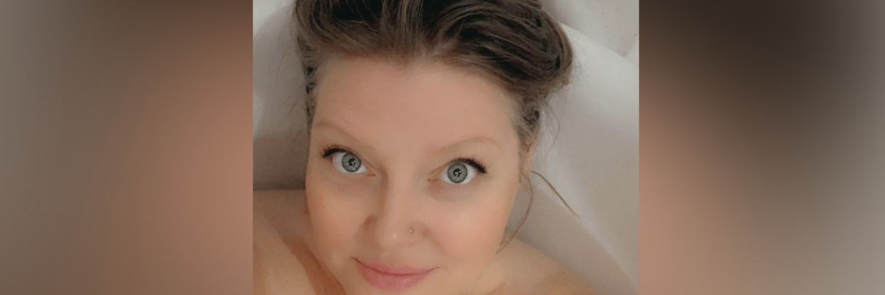 Talking About My Rare Disease: Lichen Sclerosus Photo of contributor soaking in the bath