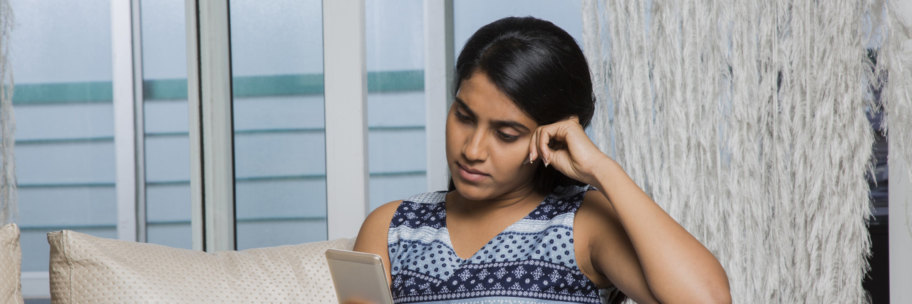 Why Rejection Sensitive Dysphoria Can Be the Hardest Part of ADHD Young teenager spending free time at home.