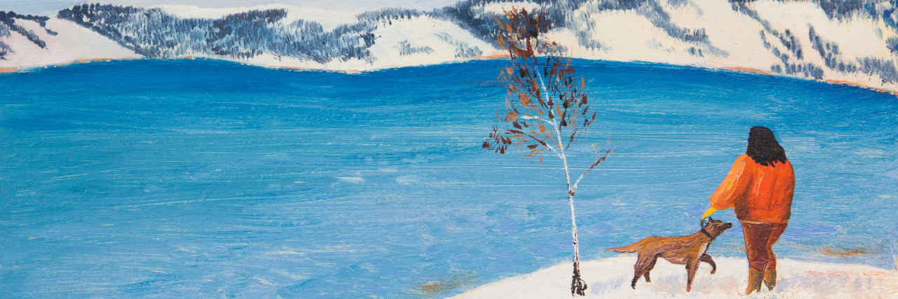 5 Tips for Accepting Your New Diagnosis Woman with dog on the shore of the lake.