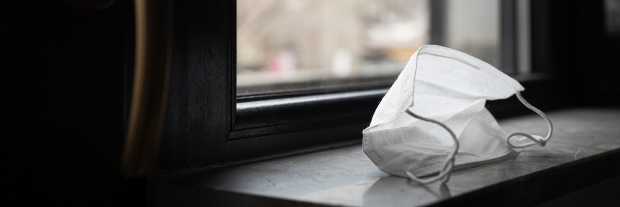 What I Hoped the World Learned From COVID-19 white face mask on a desk