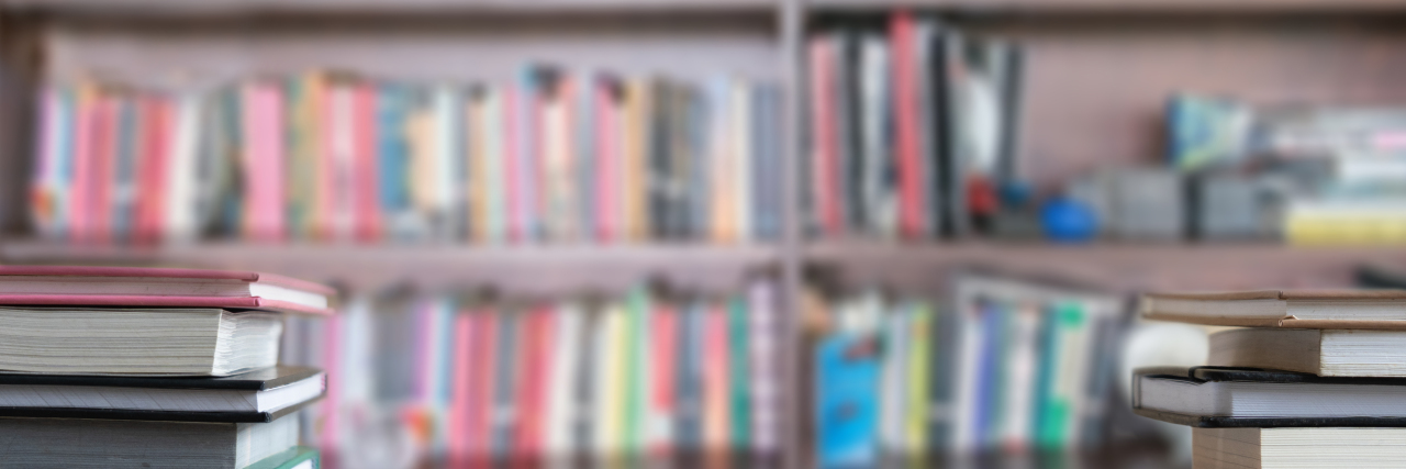 3 Ways Book Publishing Is Becoming More Disability Inclusive Books on library shelves.