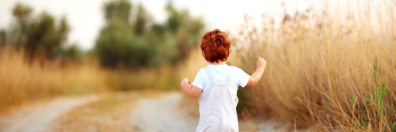 Teaching Safety Skills to Children With Autism Toddler boy running on path.