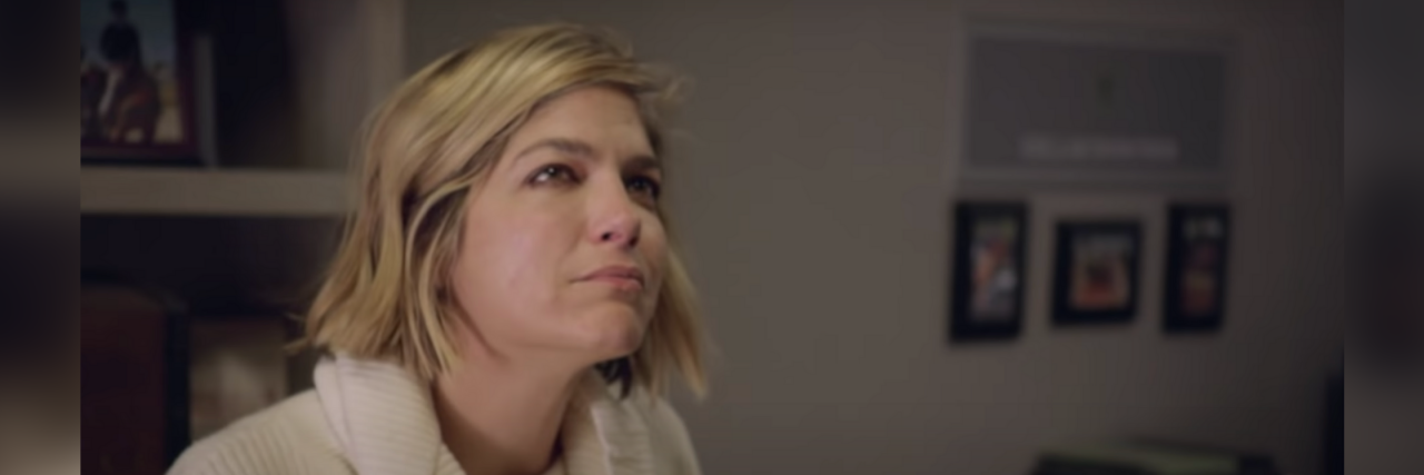 Selma Blair looking thoughtfully up at the camera in her new documentary for Discovery plus