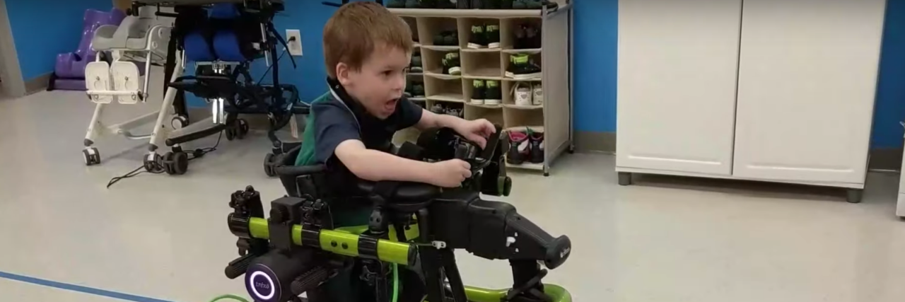 3 Major Disability-Focused Changes You Can Expect Soon A young child using a green version of Trexo Robotic's mobility aids.