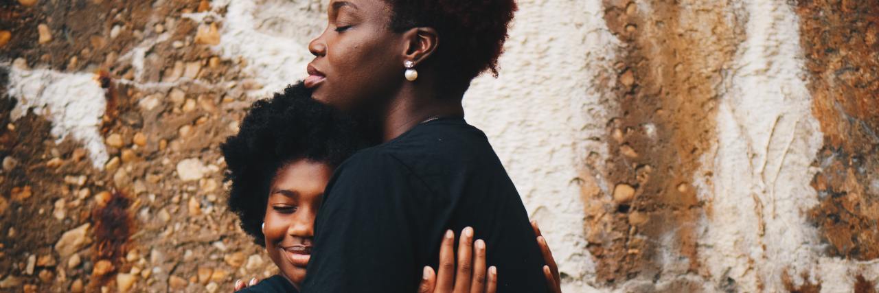 I Was Diagnosed With Bipolar Disorder, Now What? photo of two women hugging with their eyes closed