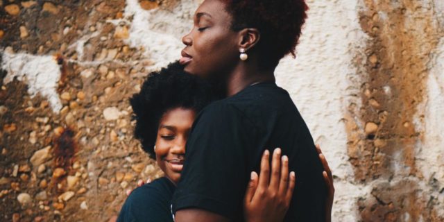 I Was Diagnosed With Bipolar Disorder, Now What? photo of two women hugging with their eyes closed